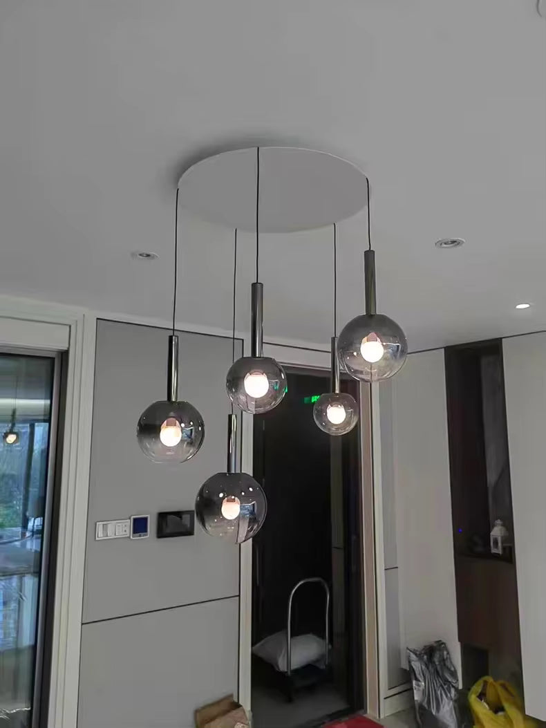 Lustre boule en verre noir plafond haut