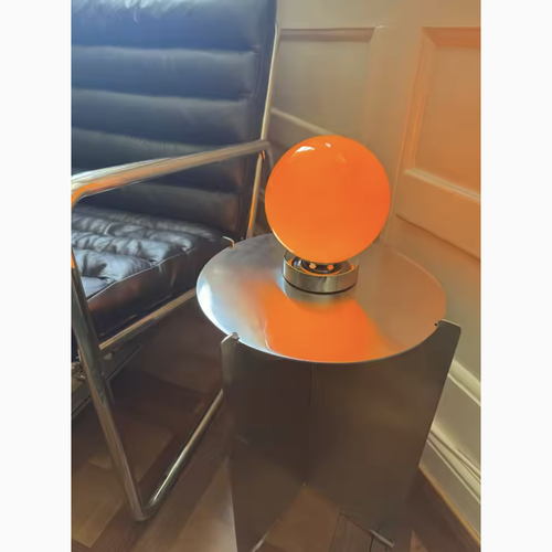 Lampe à poser boule en verre orange, photo client