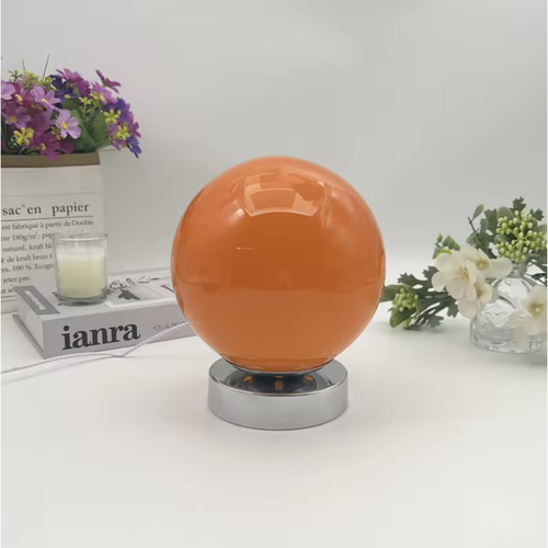 Lampe à poser boule en verre orange