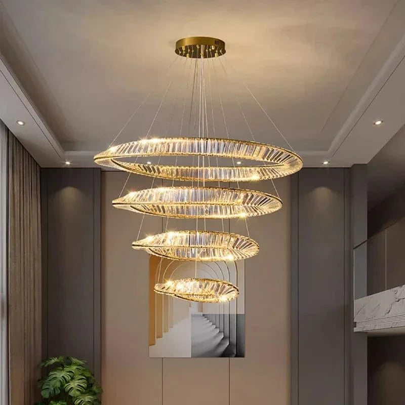 Lustre cristal anneaux dorés