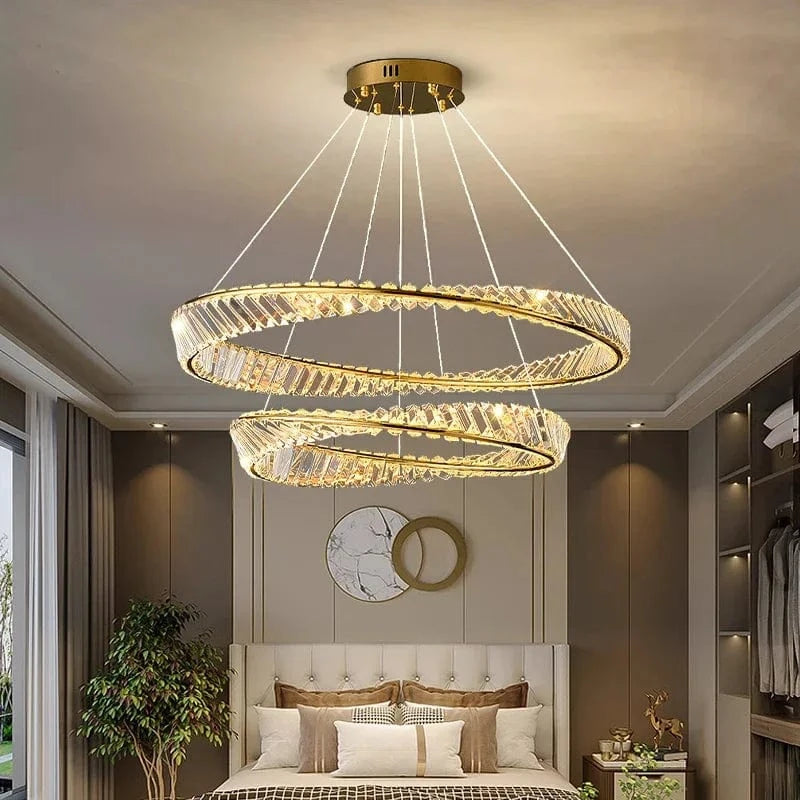 Lustre cristal anneaux dorés