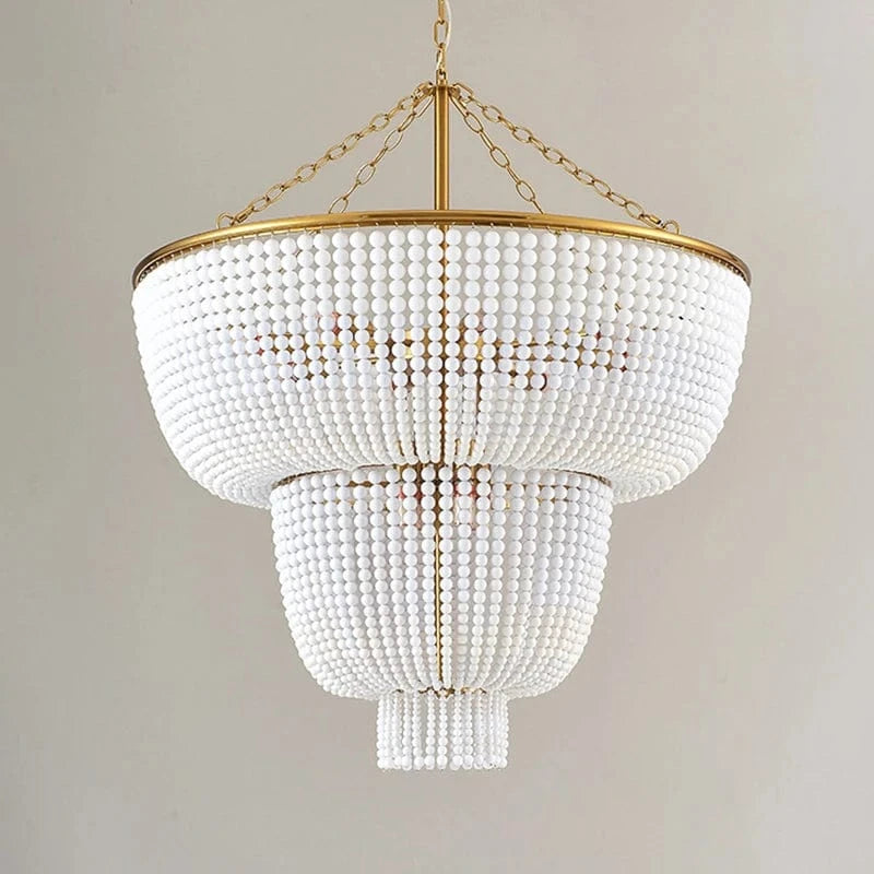 Lustre en perle de bois et dorure