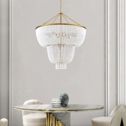 Lustre en perle de bois et dorure