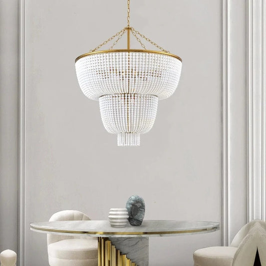Lustre en perle de bois et dorure