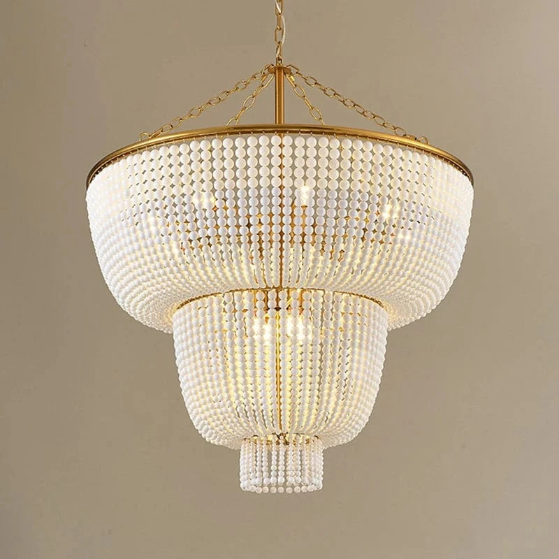 Lustre en perle de bois et dorure