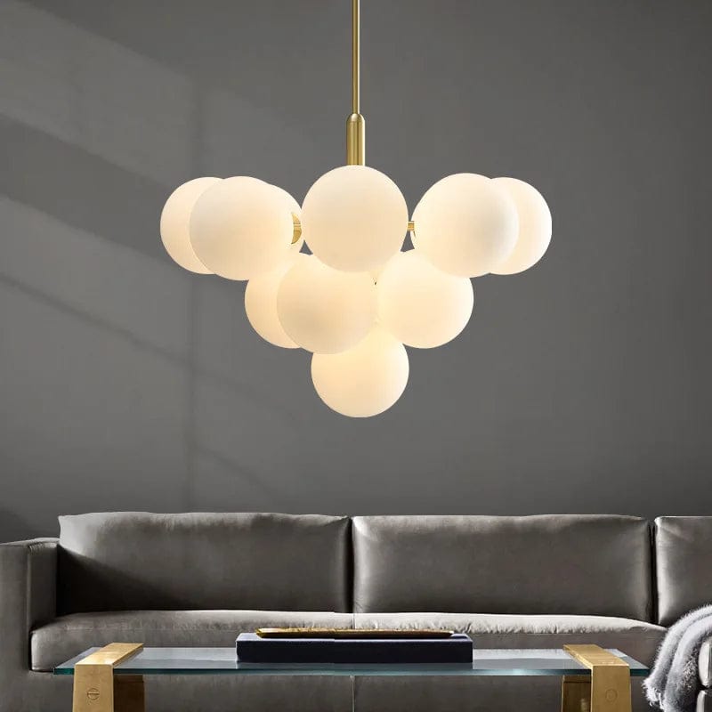 Suspension en laiton avec globes en verre opalin