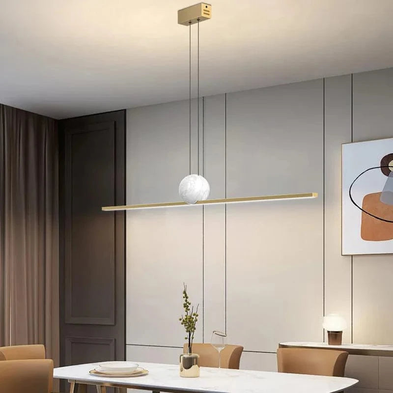 Suspension luminaire boule barre led dorée